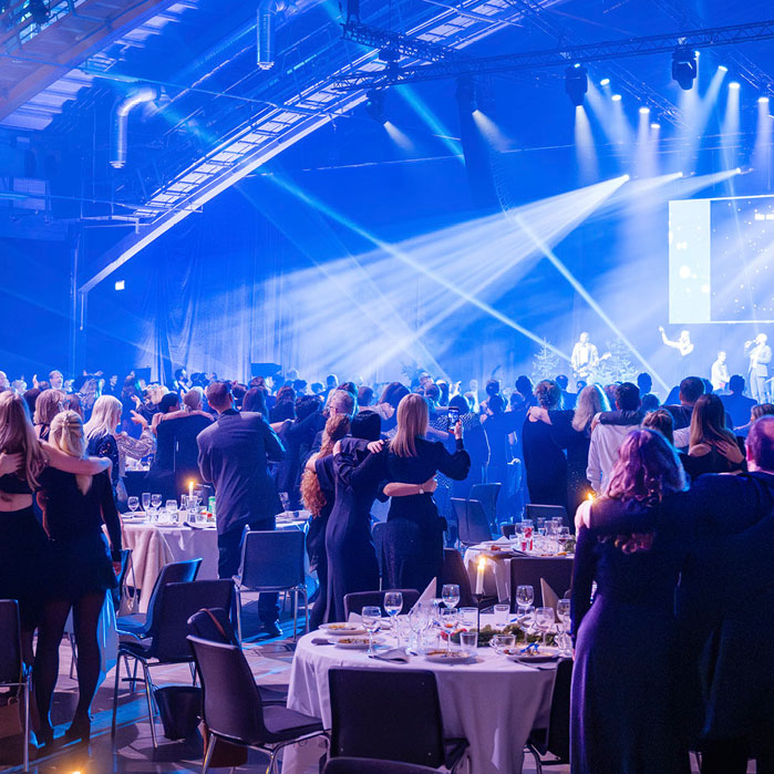 people celebrating at a banquet dinner